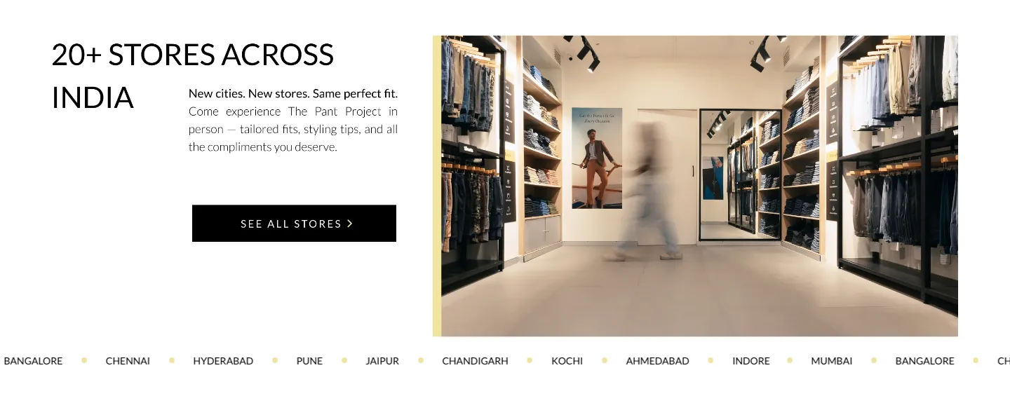 Store section with a See All Stores button, a store interior photo and a scrolling list of Indian cities Store section with a See All Stores button, a store interior photo and a scrolling list of Indian cities